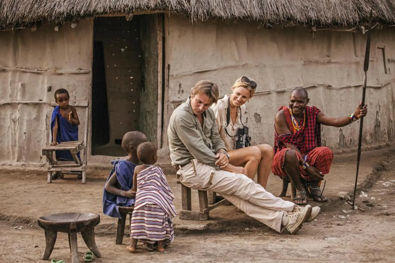 Maasai warriors in traditional attire during cultural tour near Moshi